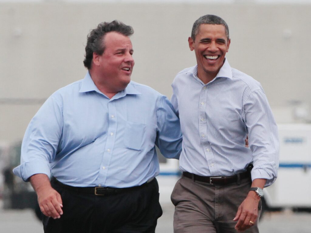 President Barack Obama walks with New Jersey Gov. Chris Christie in Newark, N.J.,  as they returned from Paterson, N.J., after viewing damage caused by Hurricane Irene, Sunday, Sept. 4, 2011. (AP Photo/Charles Dharapak)