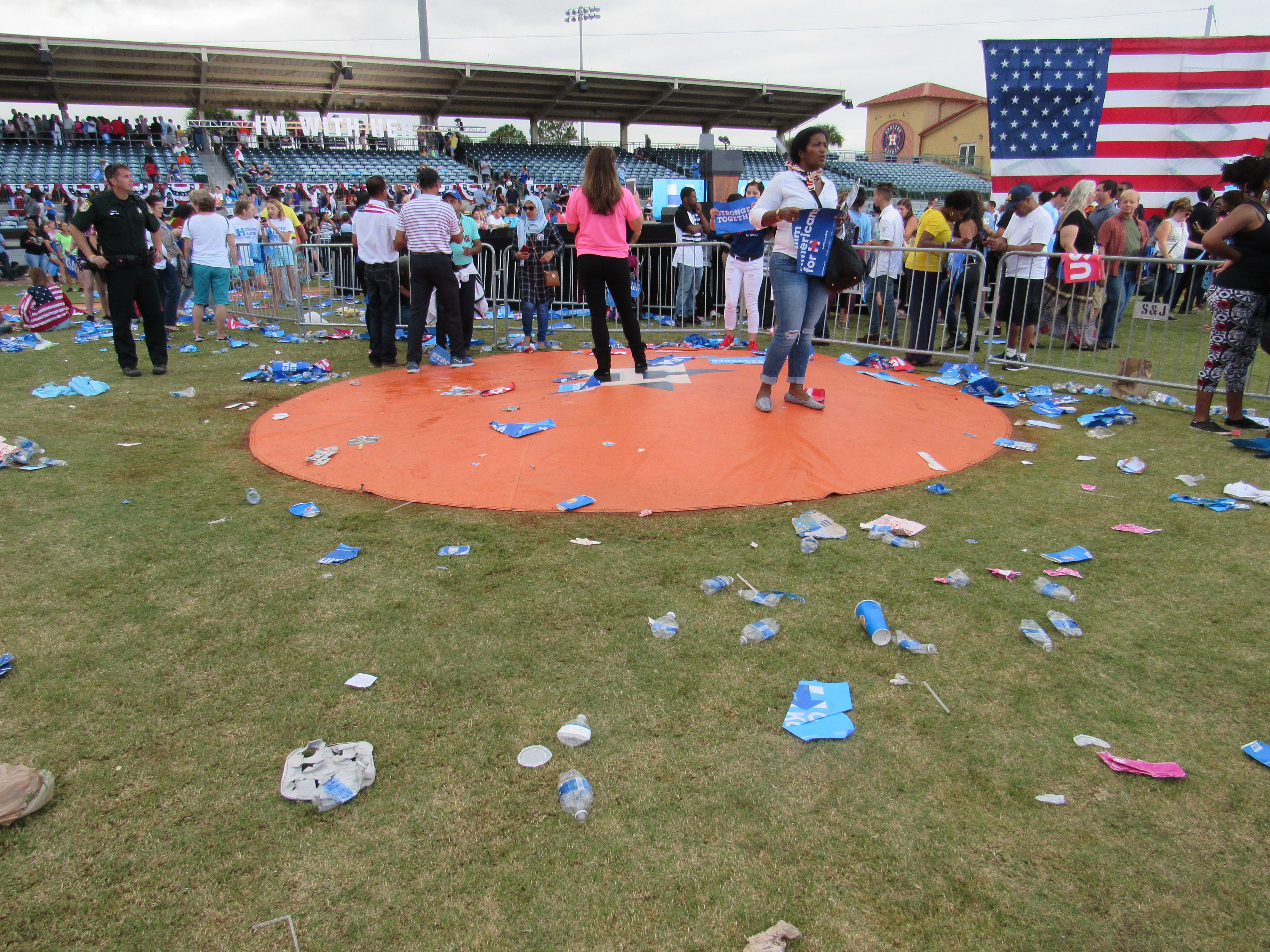 Trash around pitchers mound left by Clinton supporters after Obama rally Kissimmee FL Nov 6 2016 photo by Kristinn Taylor