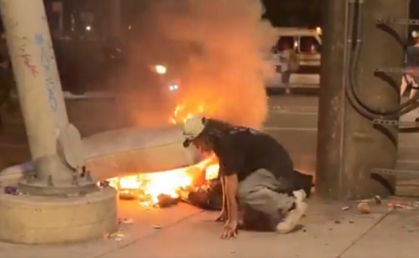 Rioters Burn Homeless Man’s Bed and Possessions, Then Just Watch As He Struggles to Pull Them From Fire (VIDEO)