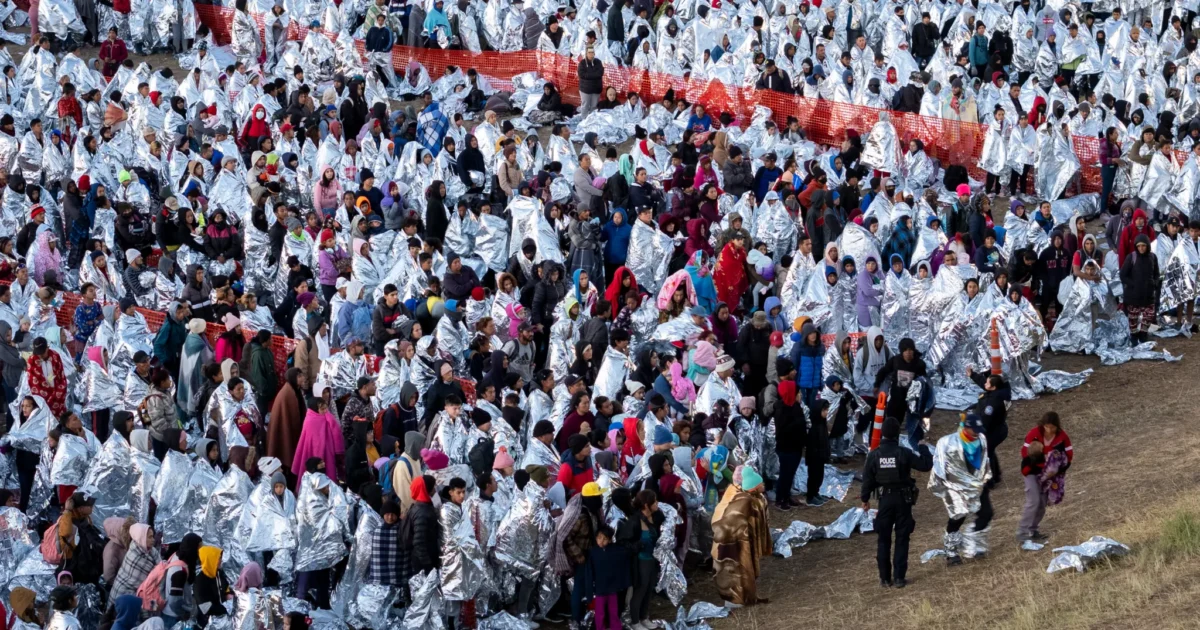 aerial-view-thousands-immigrants-wearing