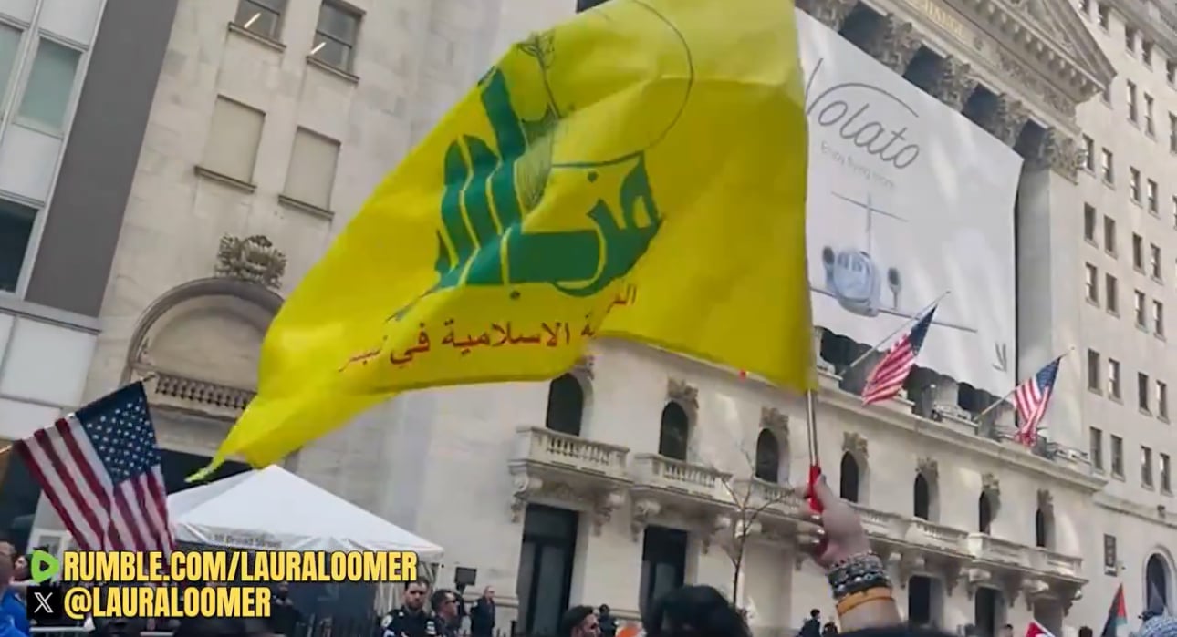 Hezbollah Flags Wave at Terrorist Rally in NYC, Protestors Assault American Flag Waving Counter Protester and Burn American Flag Screaming “DEATH TO AMERICA”