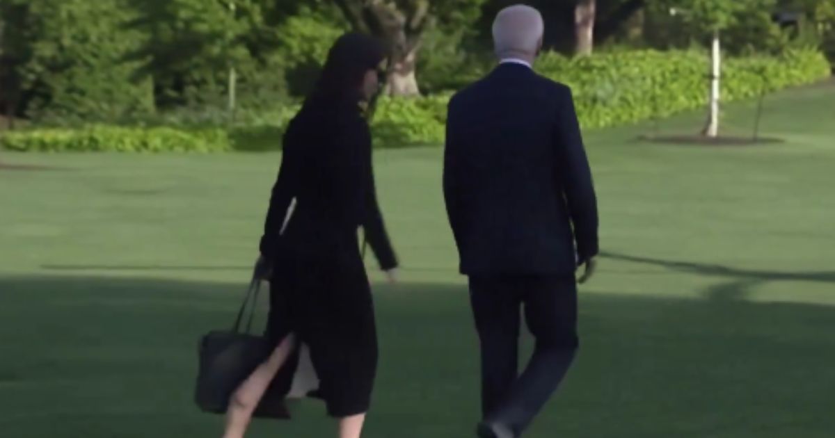 Biden’s Handler Seems to Remember Something Important Halfway to Marine One, Cameras Catch the Subtle Change