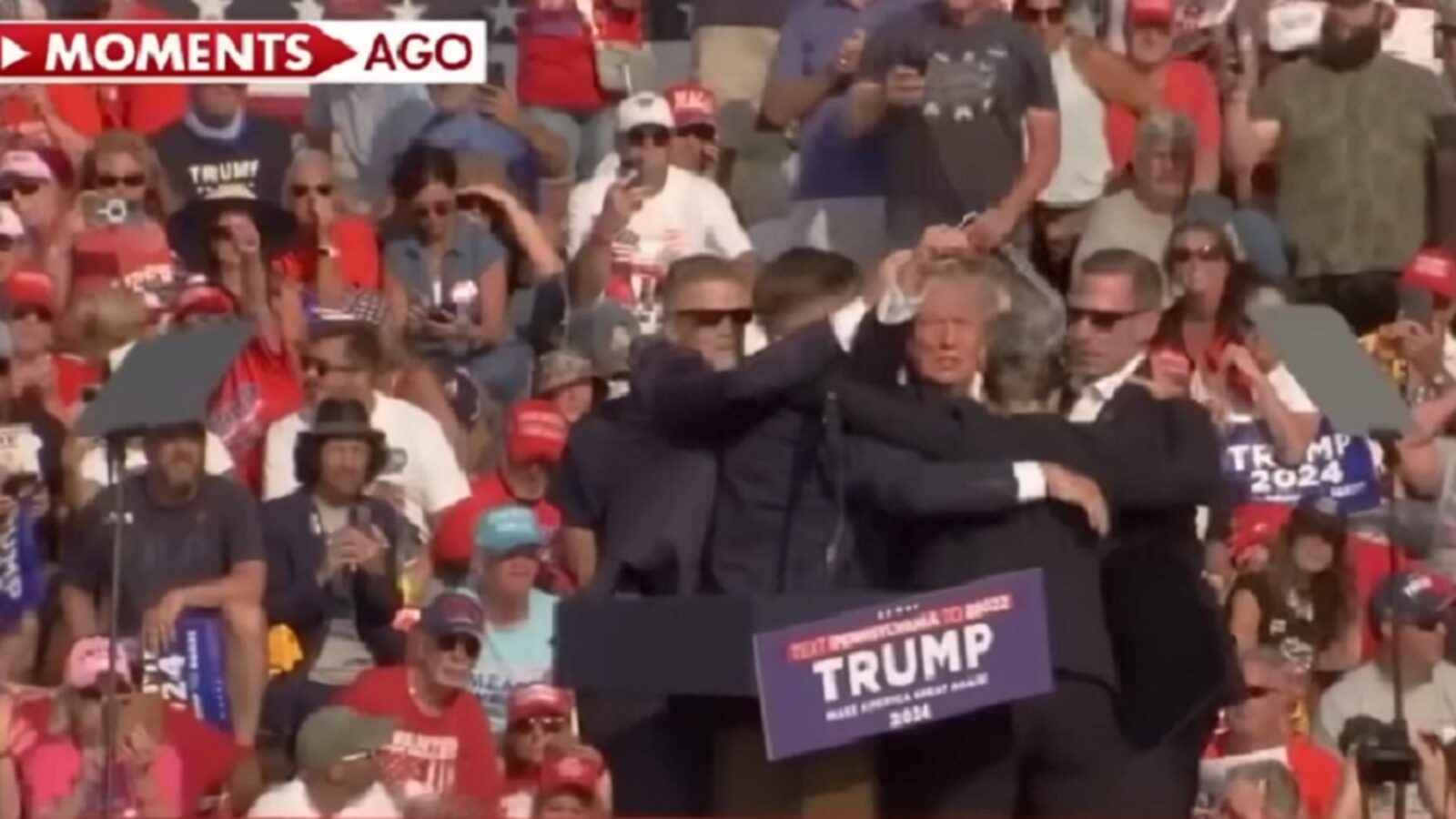 Former President Donald Trump raises his fist in the air after Saturday's shooting in Butler, Pennsylvania.