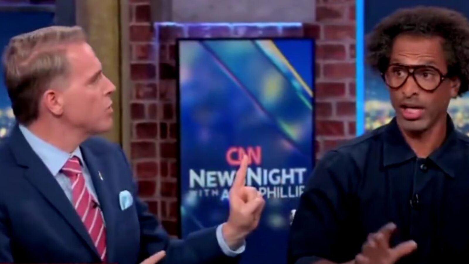 On Thursday, CNN conservative commentator Scott Jennings, left, refused to let a comment about the Trump assassination attempt in Butler, Pennsylvania, slide - attacking Touré Neblett, right, for saying Trump was "supposedly" shot in the ear.