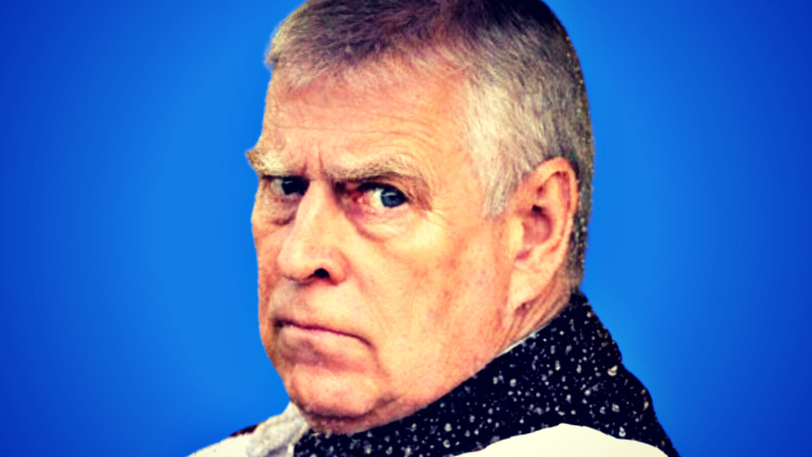 Portrait of an older man with a serious expression, wearing a patterned scarf against a blue background.