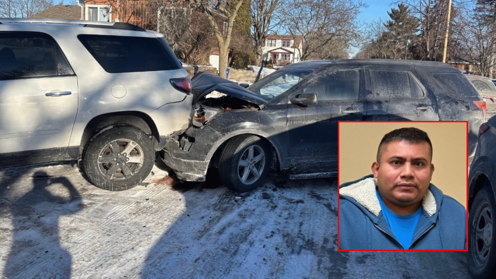 Car accident scene with two damaged vehicles in a snowy residential area, highlighting the aftermath of a collision.