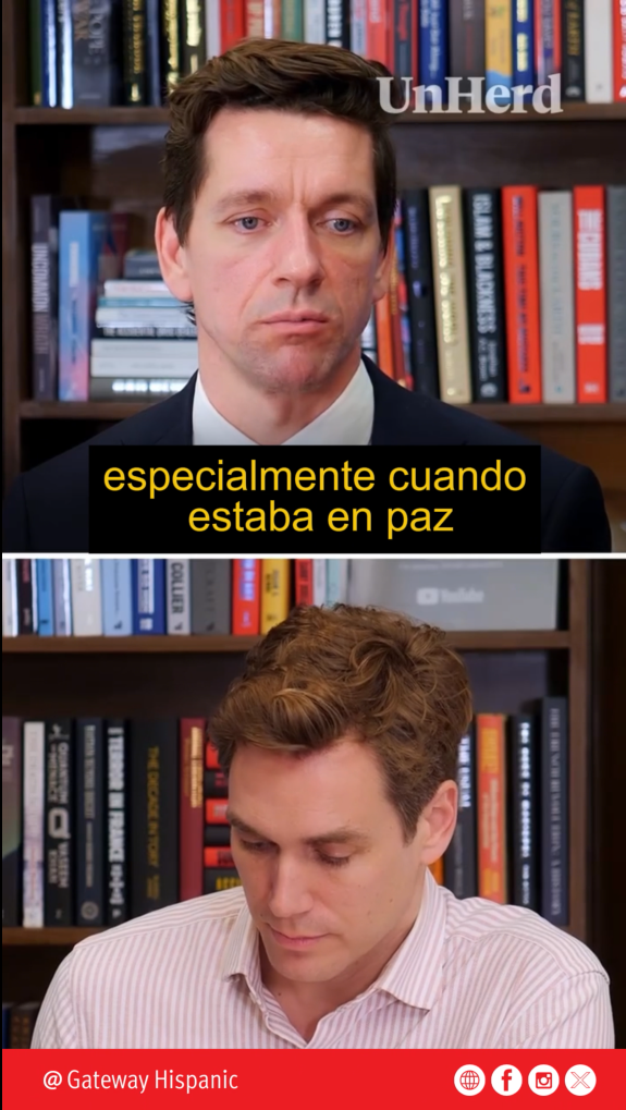 Two men engaged in a serious discussion, with bookshelves in the background, focusing on themes of peace and conflict.