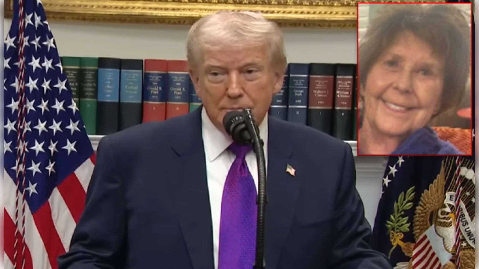 Donald Trump speaking at a podium with microphones, flanked by American flags, with an inset image of a smiling woman in the background.
