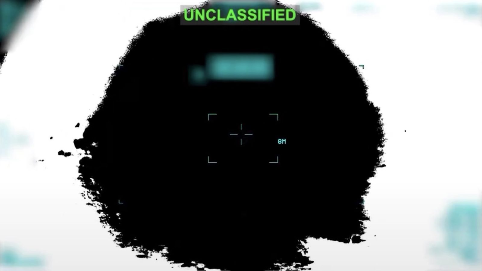 Digital display showing an unclassified image with a black silhouette and targeting reticle, emphasizing military or surveillance technology.