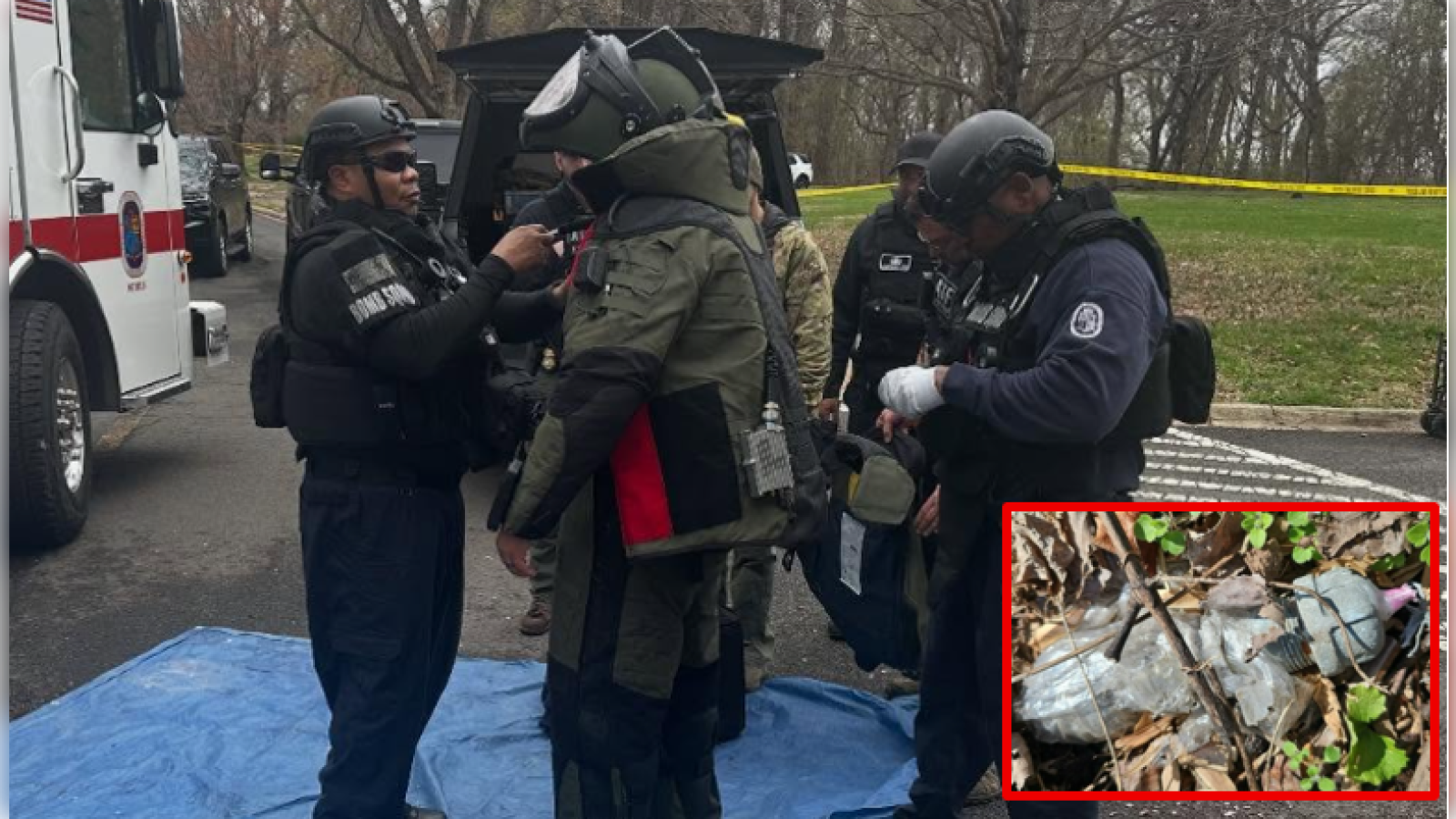 Police and bomb squad personnel prepare for a hazardous materials operation in a park, with equipment and potential evidence visible nearby.