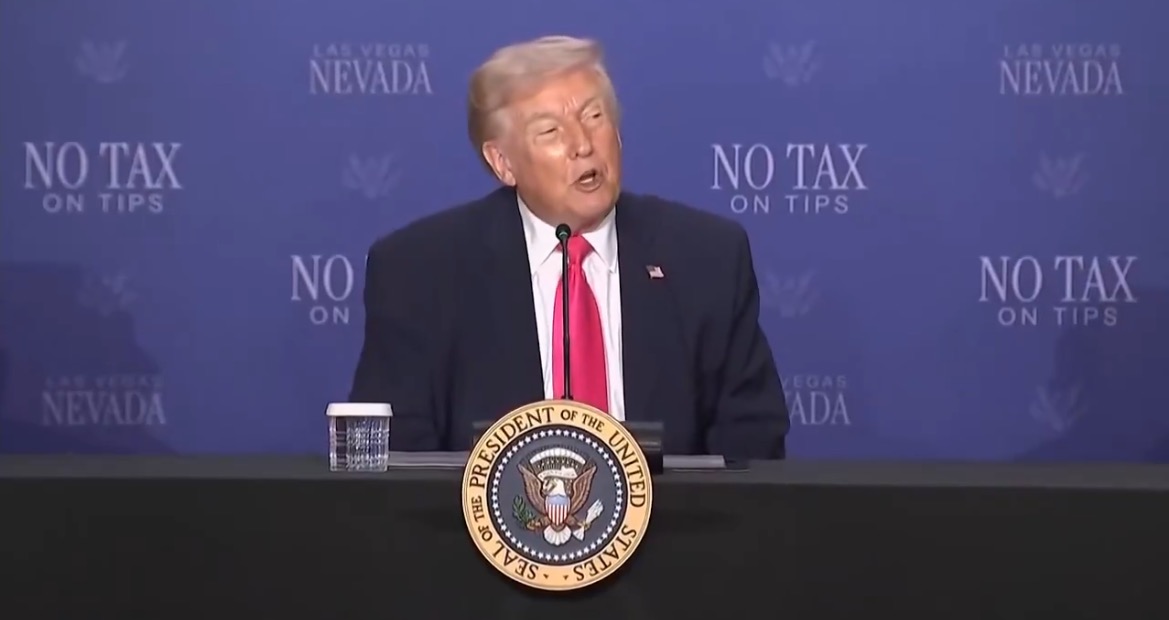 Donald Trump speaking at a press conference in Las Vegas, Nevada, addressing the topic of taxation on tips with the presidential seal visible.