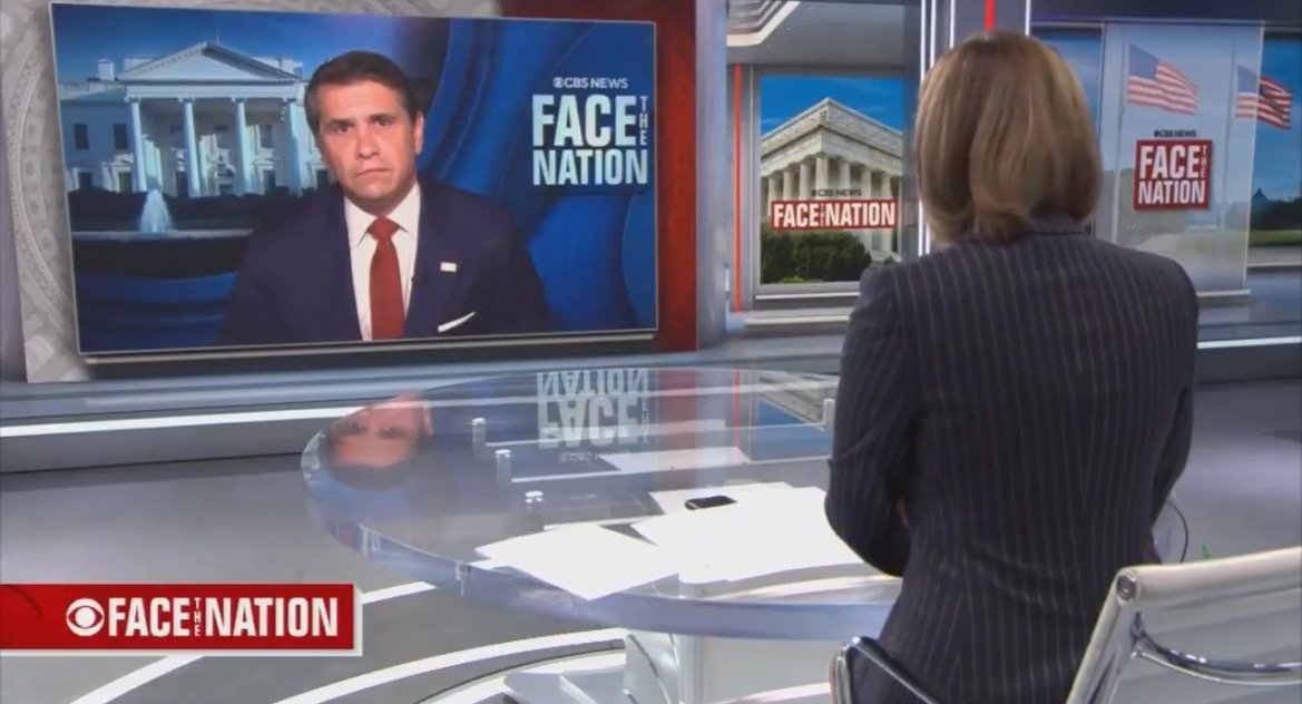 CBS News Face the Nation features a discussion with a guest in front of the White House backdrop, highlighting current political topics.
