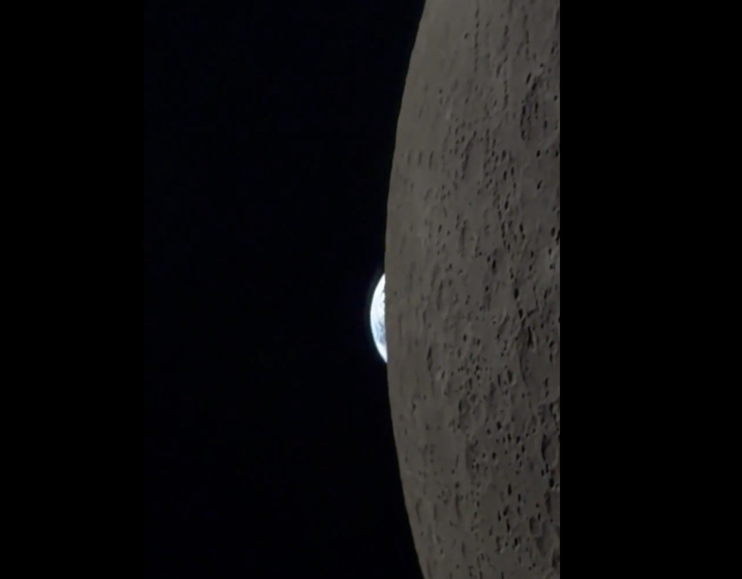 Artemis II Commander Shares Incredible iPhone Footage of Earth Disappearing Behind The Moon (VIDEO)
