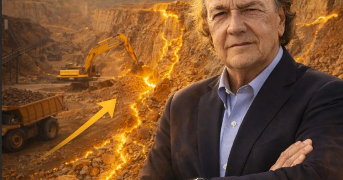 Businessman stands confidently in a mining site with heavy machinery and a glowing mineral pathway in the background, illustrating the intersection of industry and natural resources.