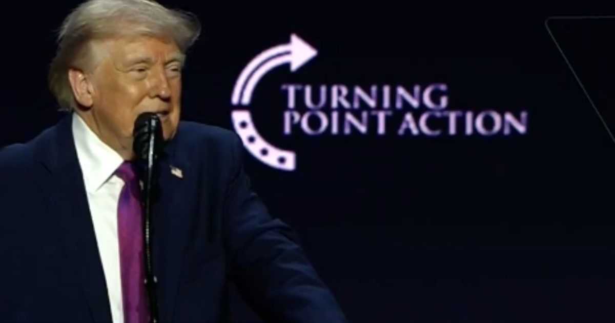Donald Trump speaking at a Turning Point Action event, highlighting key political messages and engaging with the audience.