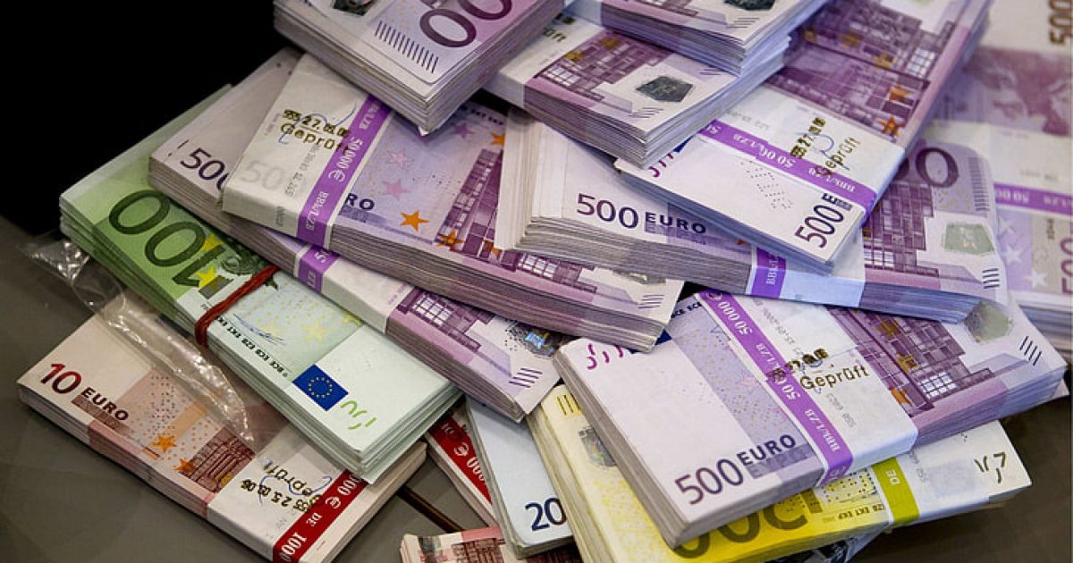 Stack of various Euro banknotes including 500, 100, and 10 Euro notes, illustrating significant currency value.