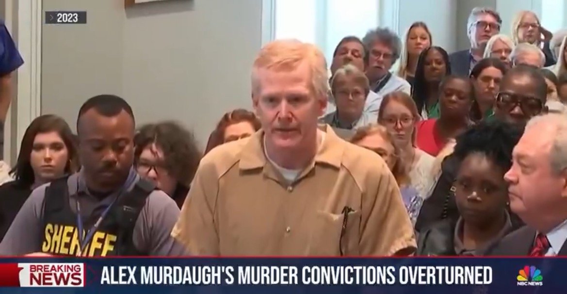 Alex Murdaugh addresses the court during a hearing about the overturning of his murder convictions, with an audience of supporters and officials present.