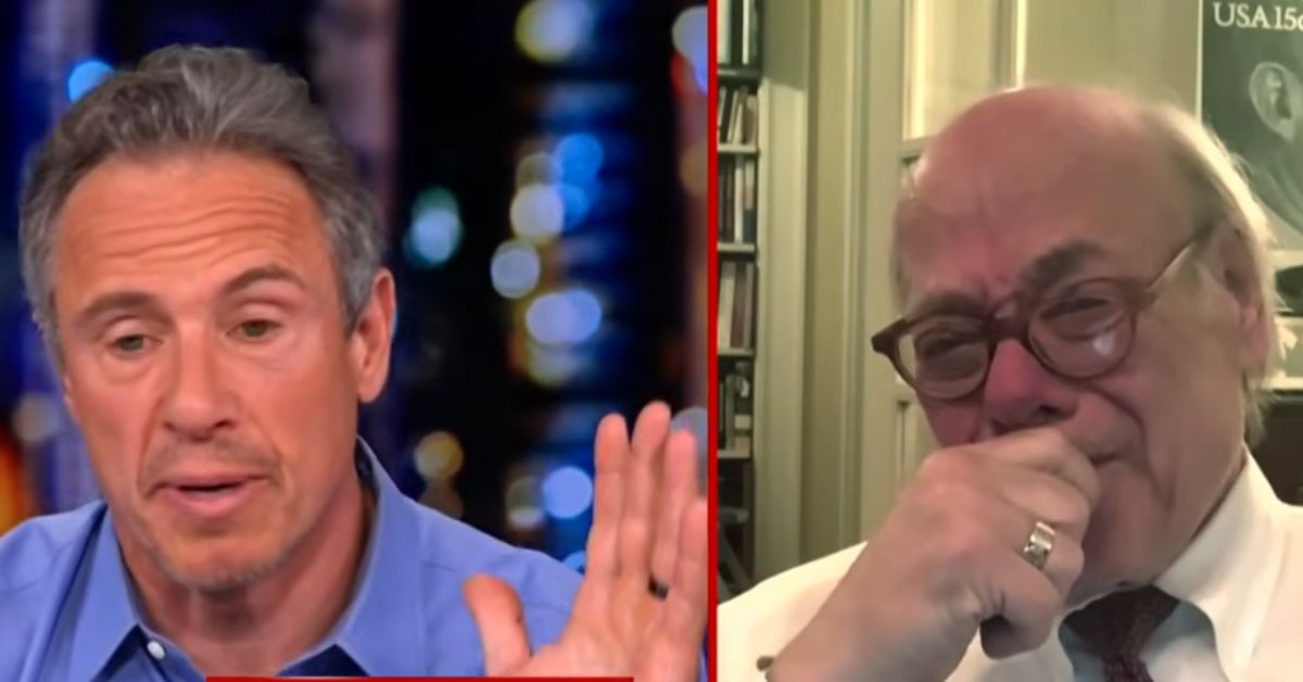 Chris Cuomo engages in a serious conversation with a guest, who appears emotional, highlighting a moment of connection during a televised discussion.