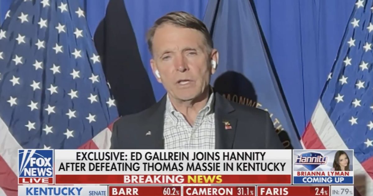 Ed Gallrein speaks on Fox News after winning against Thomas Massie in Kentucky, with American flags in the background.