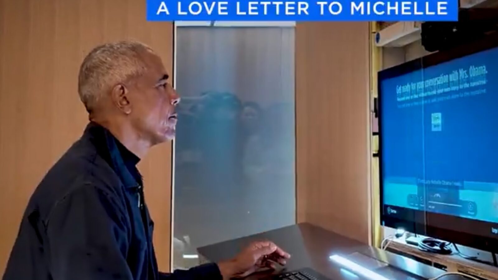 Man engaged in writing a heartfelt message on a computer, with a screen displaying a project titled "A Love Letter to Michelle."