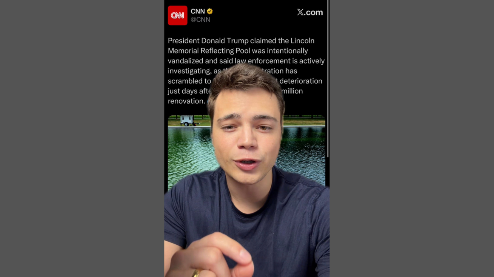 A young man speaks in front of a reflective pool, discussing allegations of vandalism at the Lincoln Memorial Reflecting Pool following recent renovations.