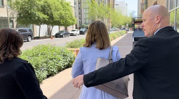 WATCH: Arizona Attorney General Kris Mayes Escorted and Shielded by Handlers as She Runs from TGP Reporter’s Questions