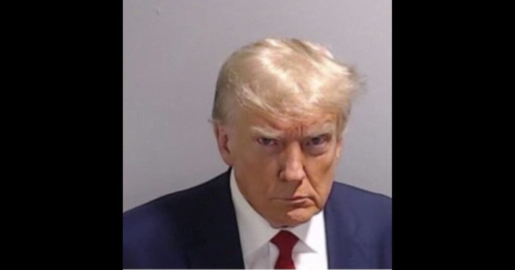 Former President Donald Trump shared his mugshot on Thursday in his first post on X since Jan. 8, 2021.