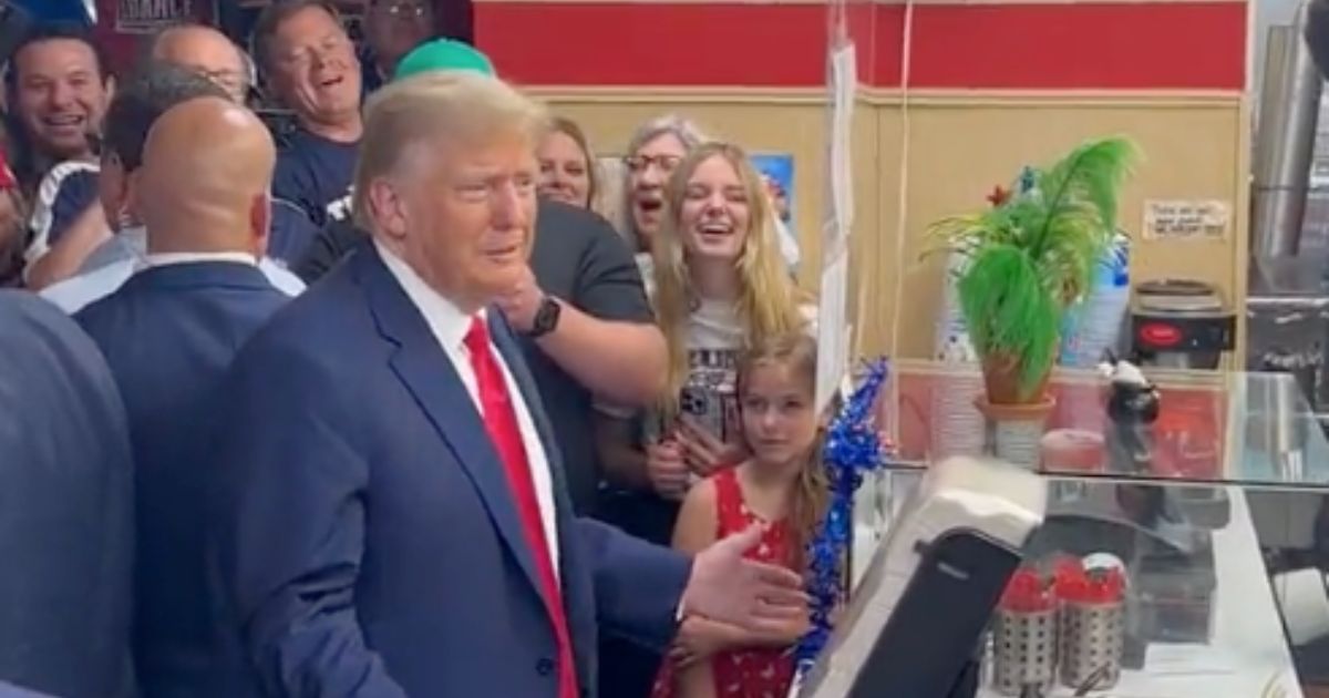 Former President Donald Trump bought ice cream for fans at a Dairy Queen in Council Bluffs, Iowa, on Friday.
