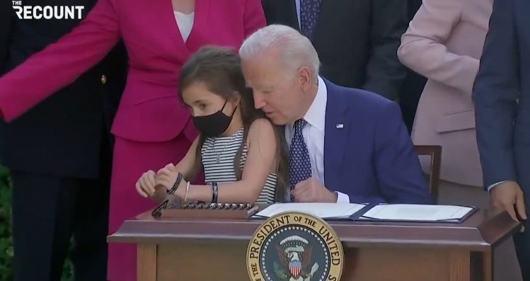 Joe Biden Grabs Little Girl, Whispers in Her Ear During Bill Signing at White House (VIDEO) | The Gateway Pundit | by Cristina Laila