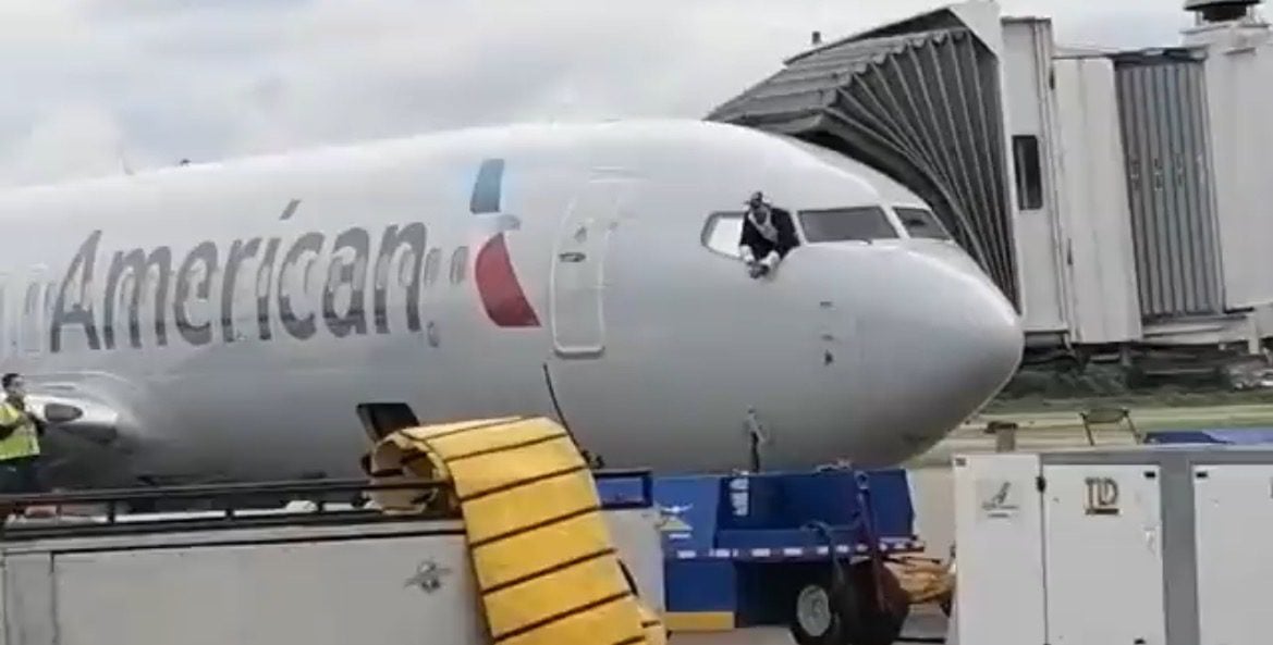 American Airlines Passenger Storms Cockpit During Boarding, Breaks Flight Controls, Tries to Jump Out Window
