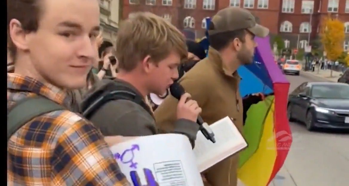 Demonic Leftists Scream at Conservative Reading Holy Bible, Protester Steals His Bible, Rips it Up and Eats Pages (VIDEO) | The Gateway Pundit | by Cristina Laila