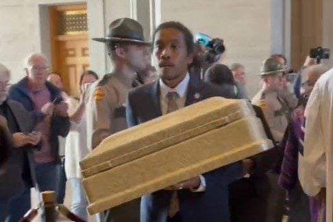 Tennessee Rep. Justin Jones Attempts to Bring Child Size Casket Inside House Chamber (VIDEO)