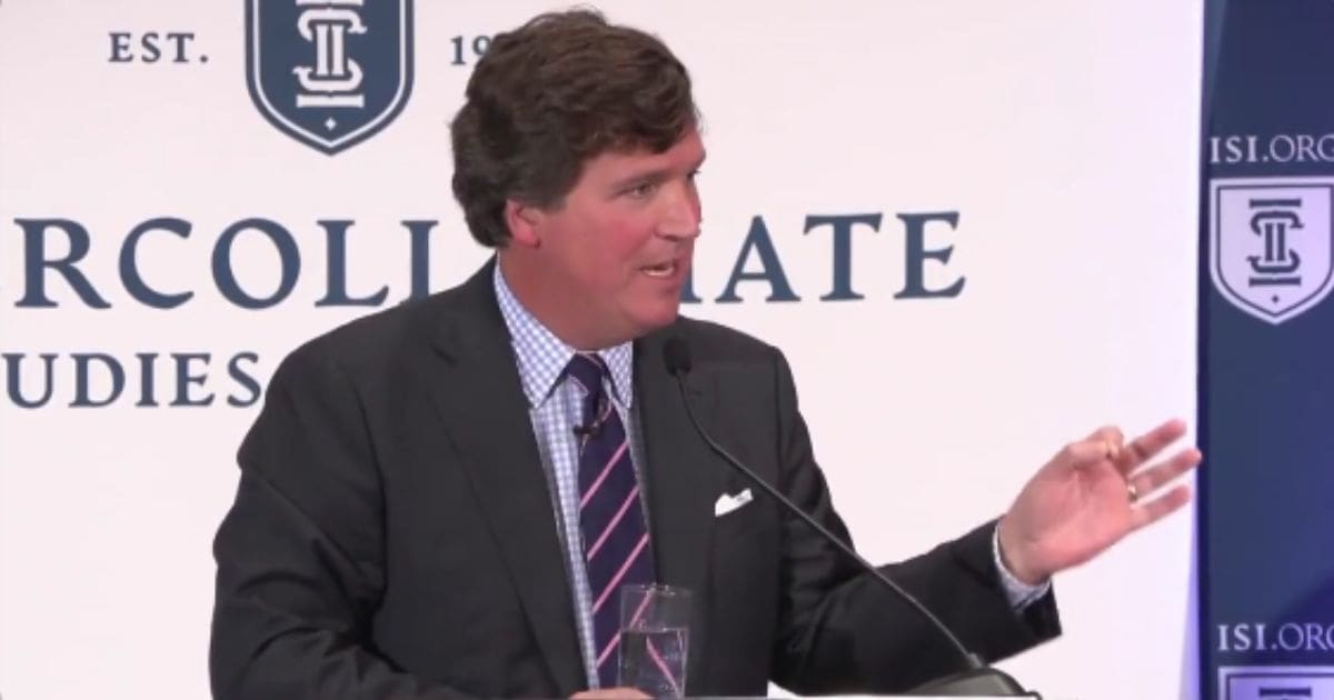 Tucker Carlson speaks on Thursday in Wilmington, Delaware.