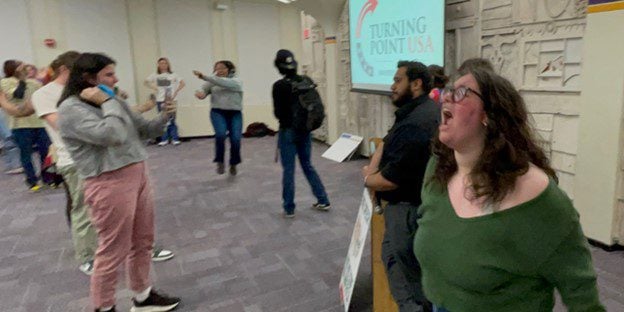 Woke Protesters Destroy Bible While Disrupting Conservative Speaker at College Campus in New York – Perform Multiple Bizarre Stunts in Middle of Speech (VIDEO)