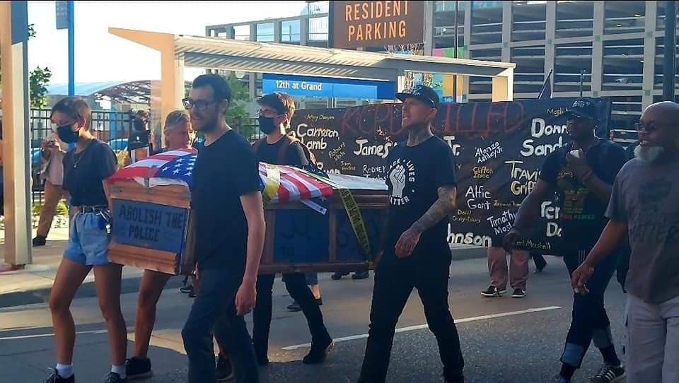 Black Lives Matter Carries Casket of Pig Dressed as a Cop in Kansas City - Rests It at Police Headquarters - In Protest to Abolish Police | The Gateway Pundit | by Jim Hoft