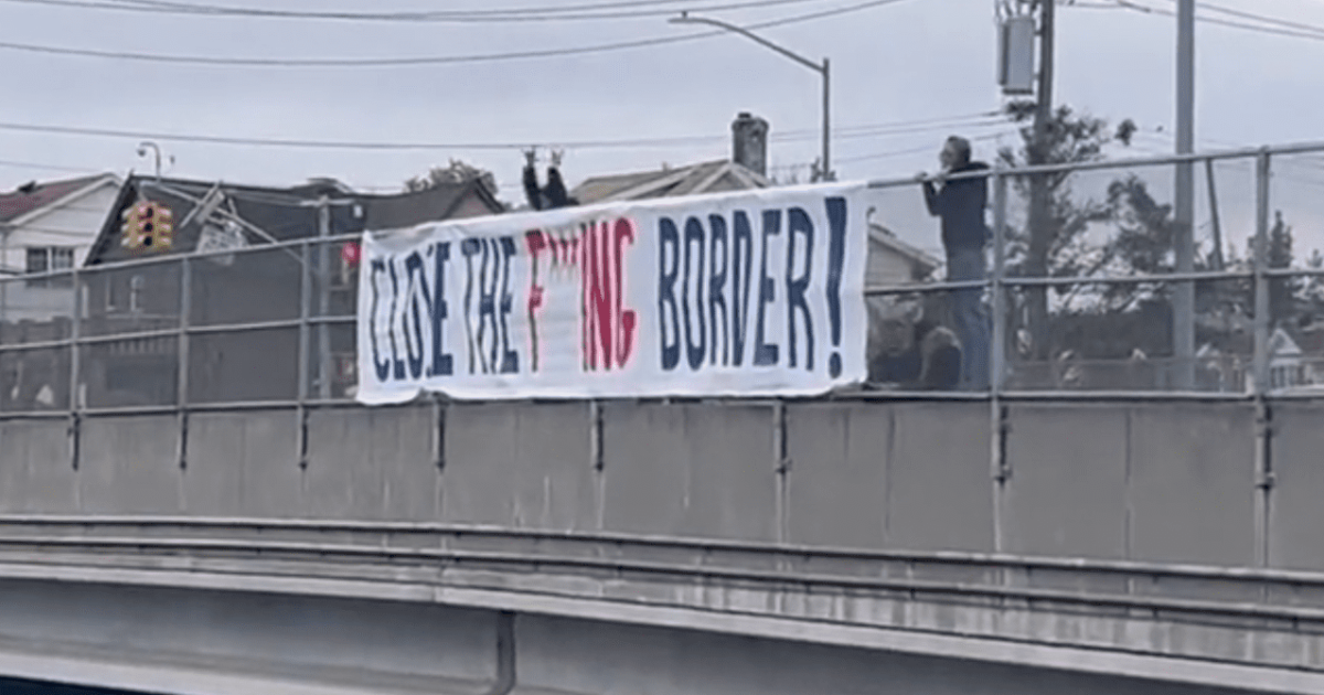 NextImg:New York City Residents Display Sign Over Freeway: CLOSE THE F***ING BORDER! | The Gateway Pundit | by Brian Lupo