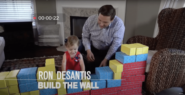 Ron DeSantis Says 2018 “Build the Wall” Ad Was “Satirical” Aimed to Manipulate Media into Talking About His Campaign (VIDEO)