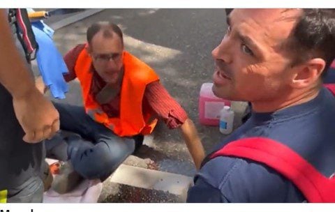 VIDEO: Idiot Eco Terrorist Screams in Pain as Rescue Workers Try to Free His Hand After He Glued Himself to Road