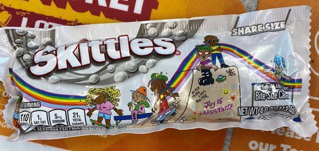 “Time for the Bud Light Treatment” – Social Media Erupts After Skittles Partners with Far-Left Group Which Supports Sex Procedures for Children and Places “Black Trans Lives Matter” On Its Packaging