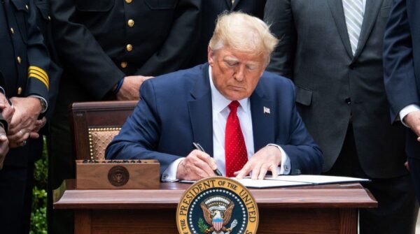 As the 2020 Election Continues In the Courts, The Deadline for President Trump’s Executive Order Regarding Foreign Intervention in US Elections Silently Approaches Trumpsigns-2-600x335