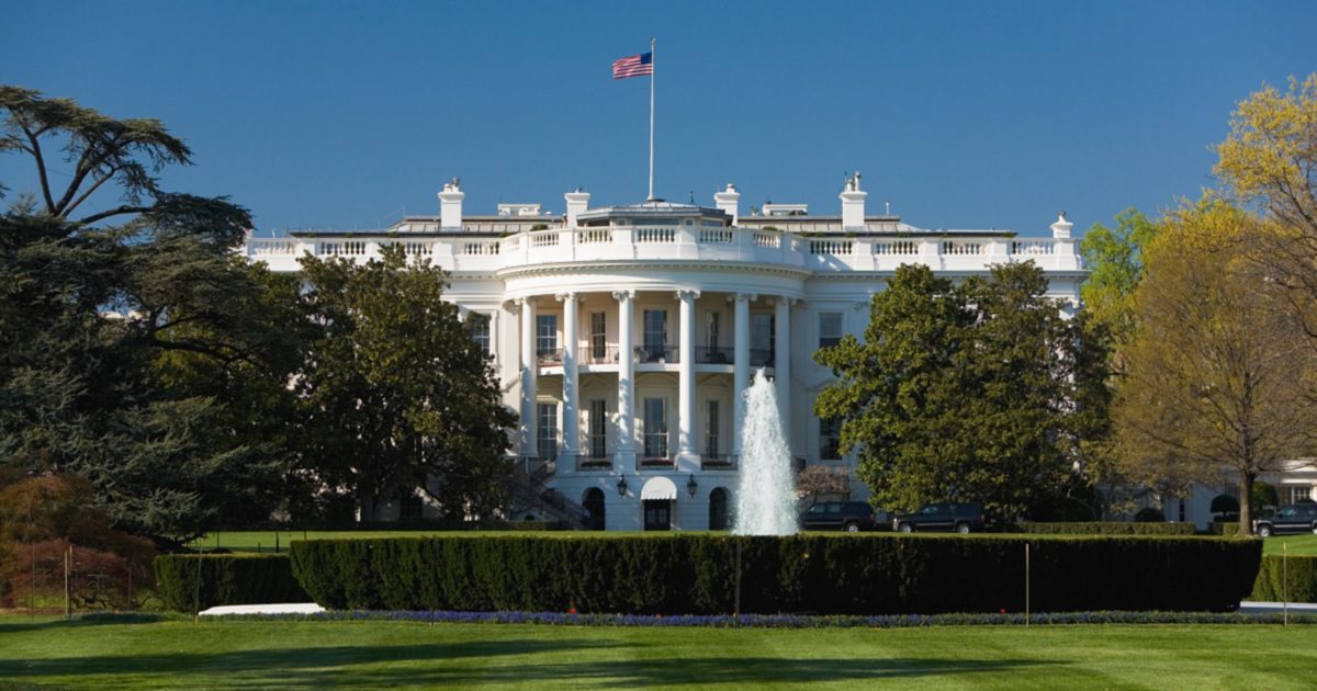 The White House is photographed from the South Lawn.